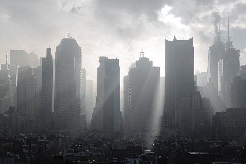Sunlight through city skyscrapers