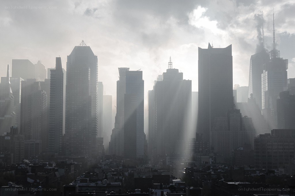 Sunlight through city skyscrapers