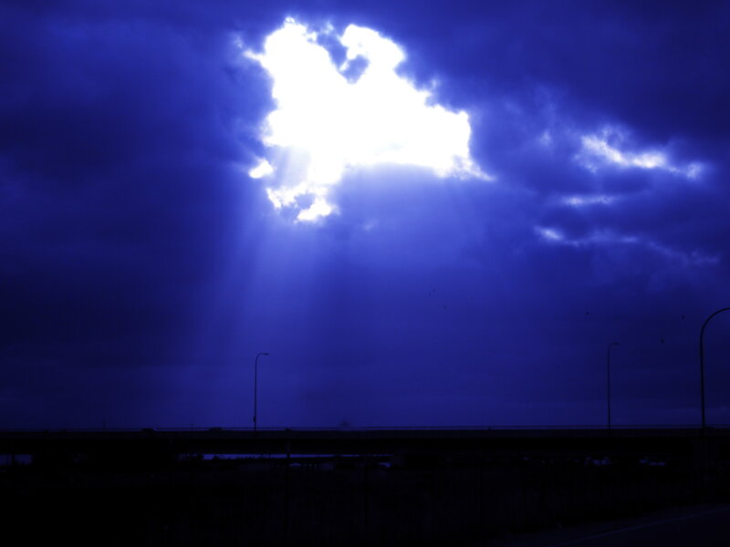 Sunlight Through Clouds — Blue, Dramatic, Night, Photograph, Bridge