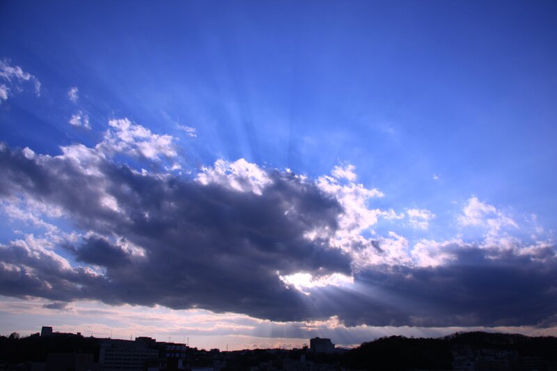 Sunlight Through Clouds — Blue, Dramatic, Sunrise, Photograph, Cityscape