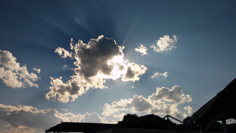 Sunlight Through Clouds — Blue, Dramatic, Sunrise, Photograph, Sky, Buildings