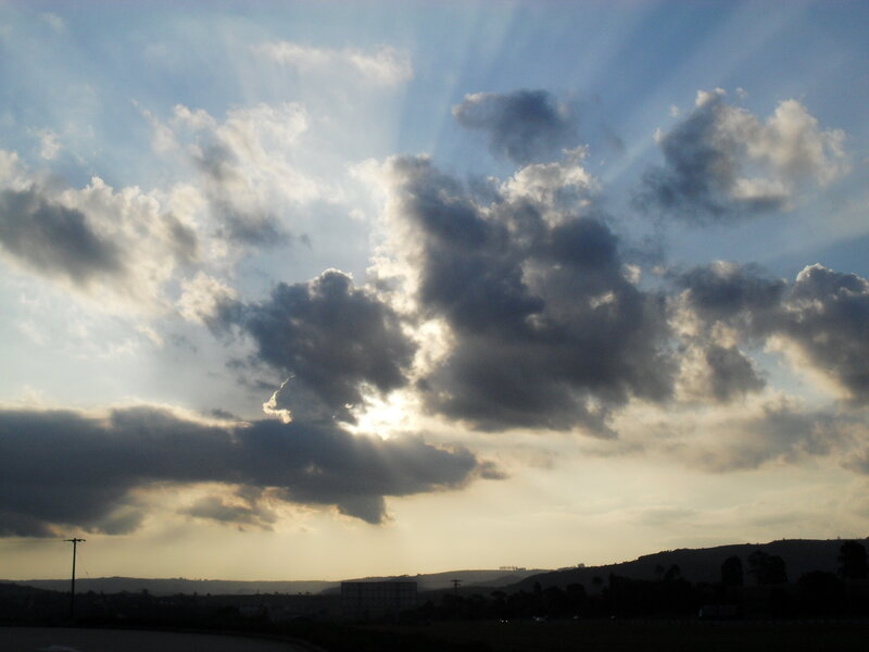 Sunlight Through Clouds — Blue, Dramatic, Sunset, Photograph, Hills