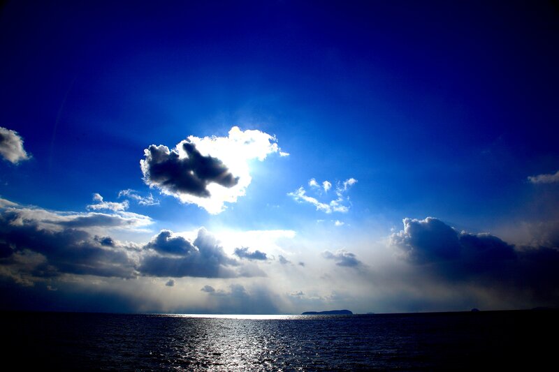 Sunlight Through Clouds — Blue, Dramatic, Sunset, Photograph, Sea