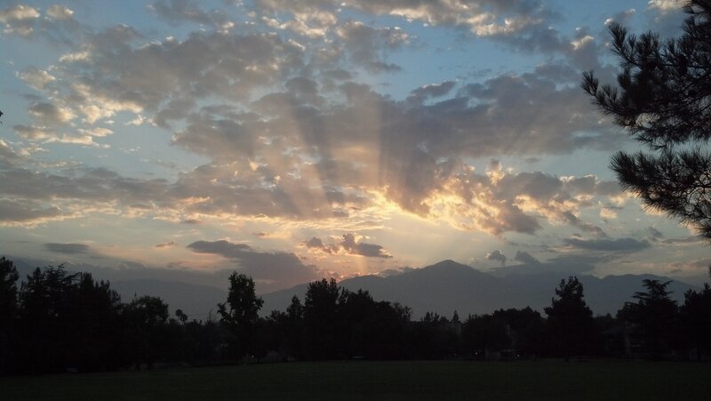 Sunlight Through Clouds — Blue, Serene, Sunset, Photograph
