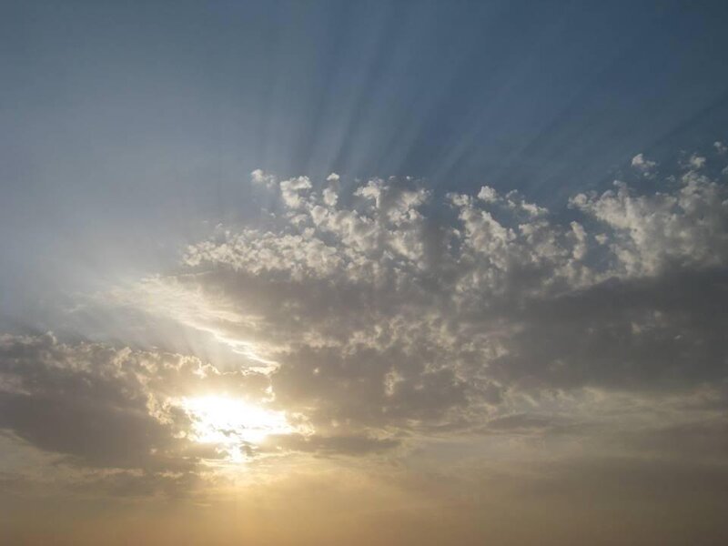 Sunlight Through Clouds — Blue, Serene, Sunset