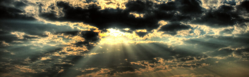 Sunlight Through Clouds — Dramatic