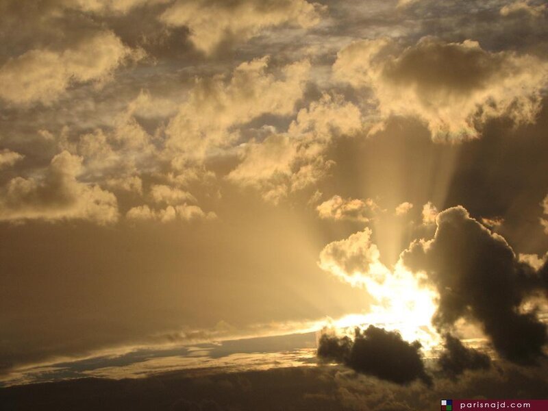Sunlight Through Clouds — Gold, Dramatic, Sunset