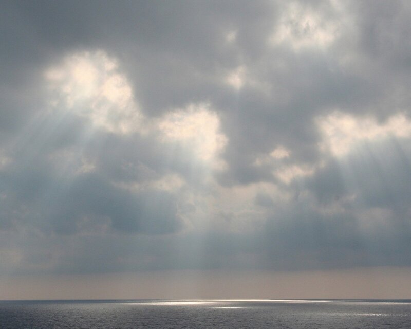 Sunlight Through Clouds — Gray, Dramatic, Afternoon, Photograph, Sea