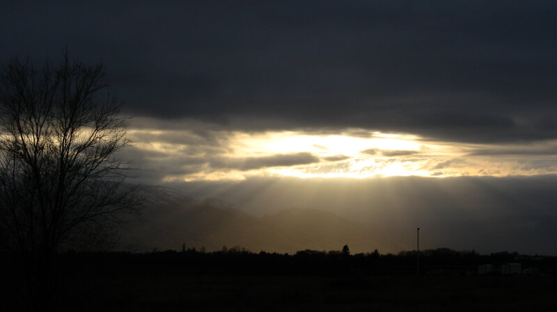 Sunlight Through Clouds — Gray, Dramatic, Sunrise, Photograph, Mountains