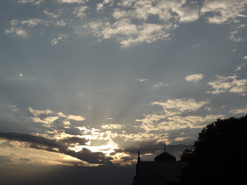 Sunlight Through Clouds — Gray, Dramatic, Sunset, Photograph, Building, Tree