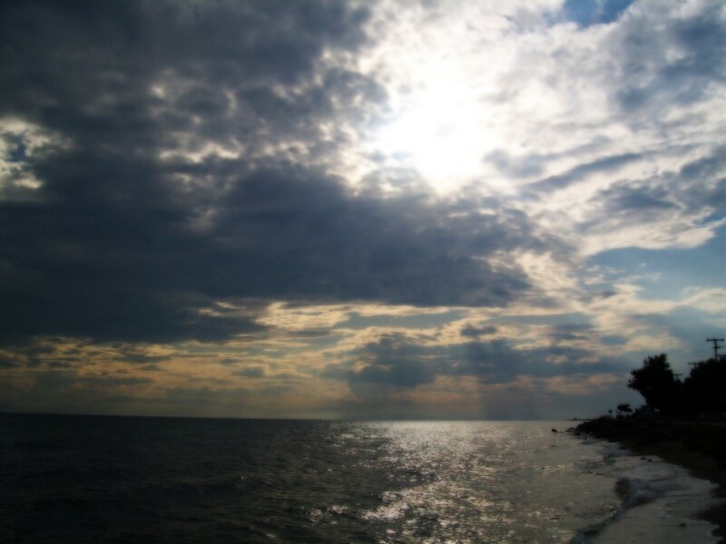 Sunlight Through Clouds — Gray, Dramatic, Sunset, Photograph, Sea, Shoreline
