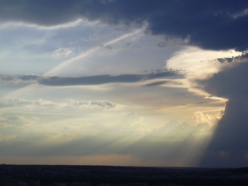 Sunlight Through Clouds — Gray, Dramatic, Sunset, Photograph, Sky, Cityscape