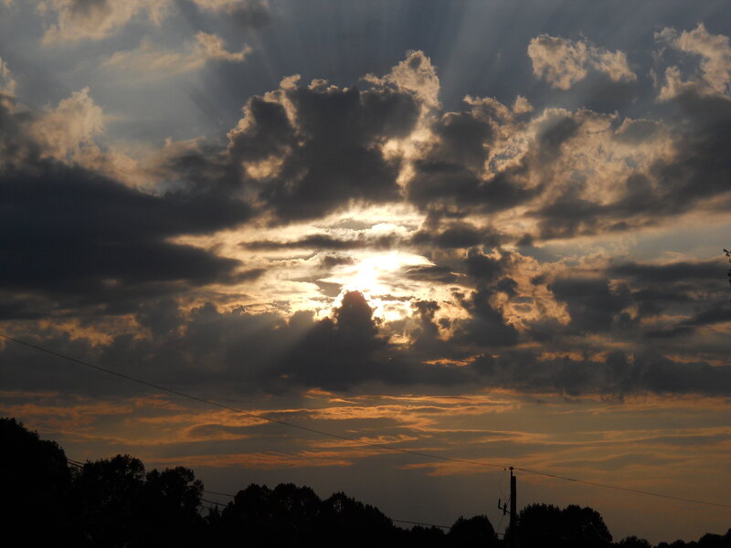 Sunlight Through Clouds — Gray, Dramatic, Sunset, Photograph, Trees, Power Lines