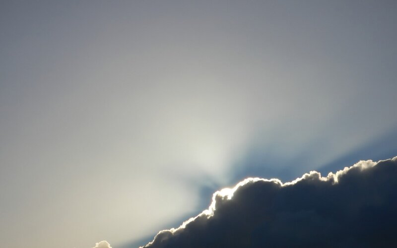 Sunlight Through Clouds — Gray, Photograph