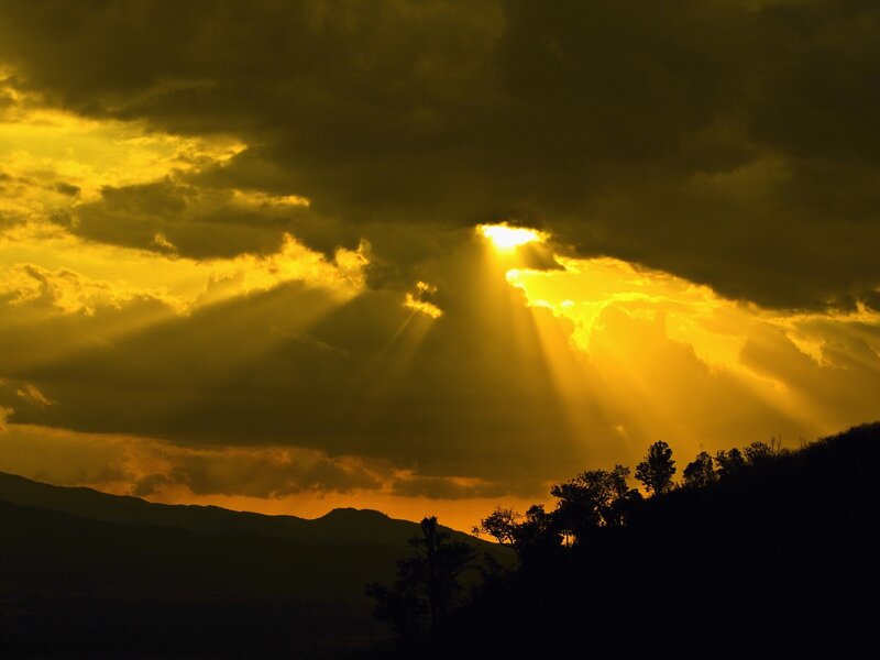 Sunlight Through Clouds — Mountains