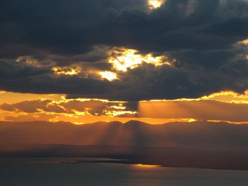 Sunlight Through Clouds — Orange, Dramatic, Sunset, Photograph, Mountains