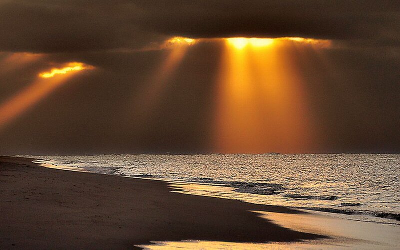 Sunlight Through Clouds — Orange, Dramatic, Sunset, Photograph, Ocean