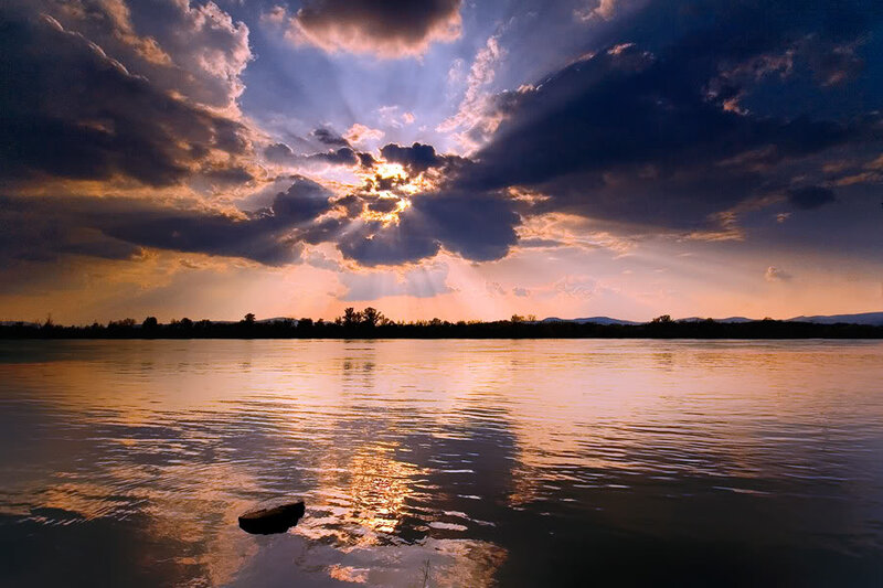 Sunlight Through Clouds — Orange, Dramatic, Sunset, Photograph, River