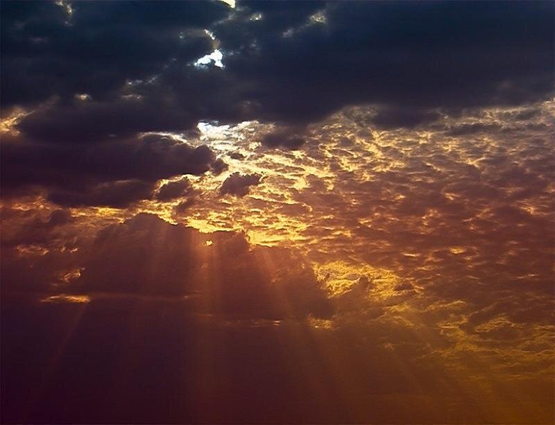 Sunlight Through Clouds — Orange, Dramatic, Sunset