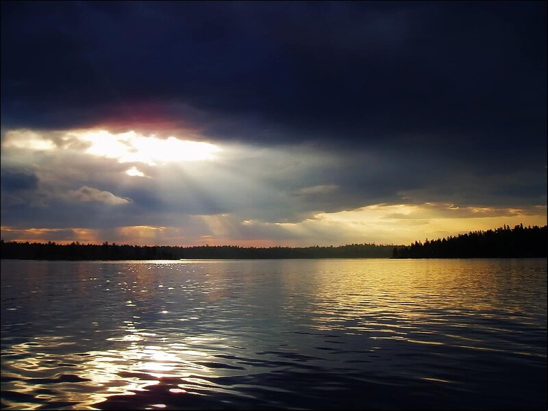 Sunlight Through Clouds over Lake — Blue, Dramatic, Sunset