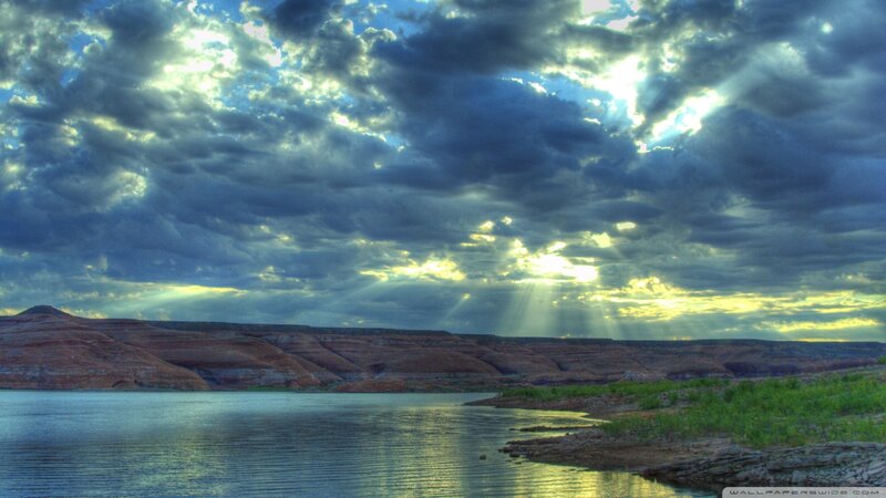 Sunlight Through Clouds over Lake