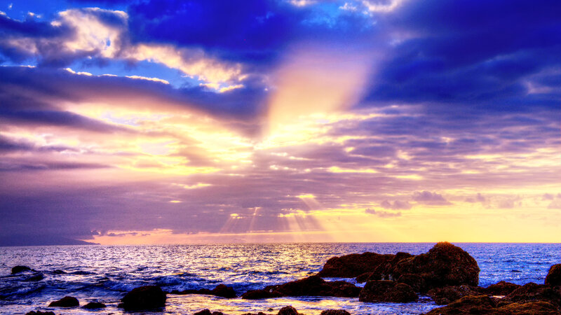 Sunlight Through Clouds over Ocean — Blue, Dramatic, Sunset