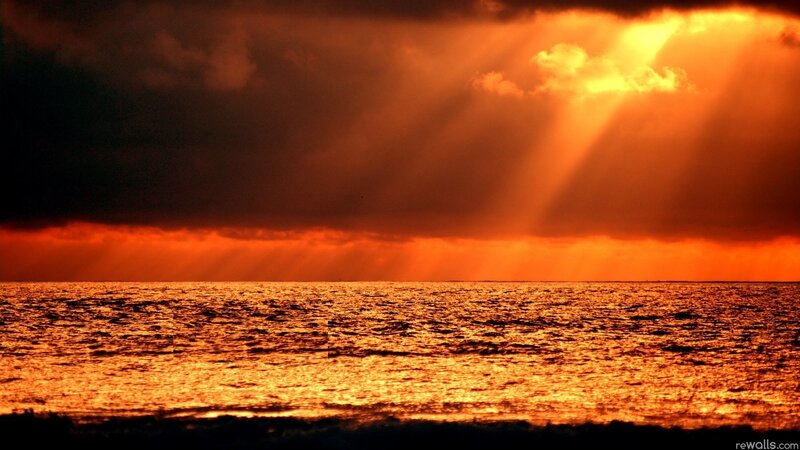 Sunlight Through Clouds over Ocean — Orange, Dramatic, Sunset, Photograph