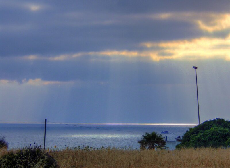Sunlight Through Clouds over Sea — Blue, Dramatic, Sunrise, Photograph