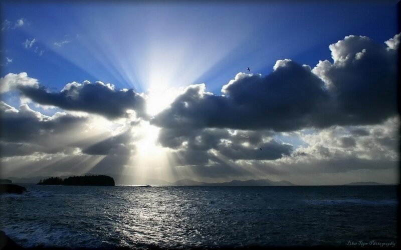 Sunlight Through Clouds over Sea — Blue, Dramatic, Sunrise