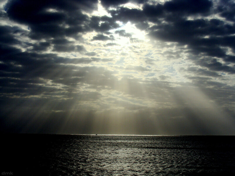Sunlight Through Clouds over Sea — Gray, Dramatic, Sunset, Photograph, Sunbeams