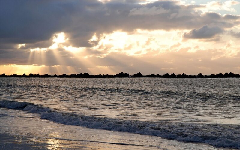 Sunlight Through Clouds over Sea — Gray, Dramatic, Sunset, Photograph