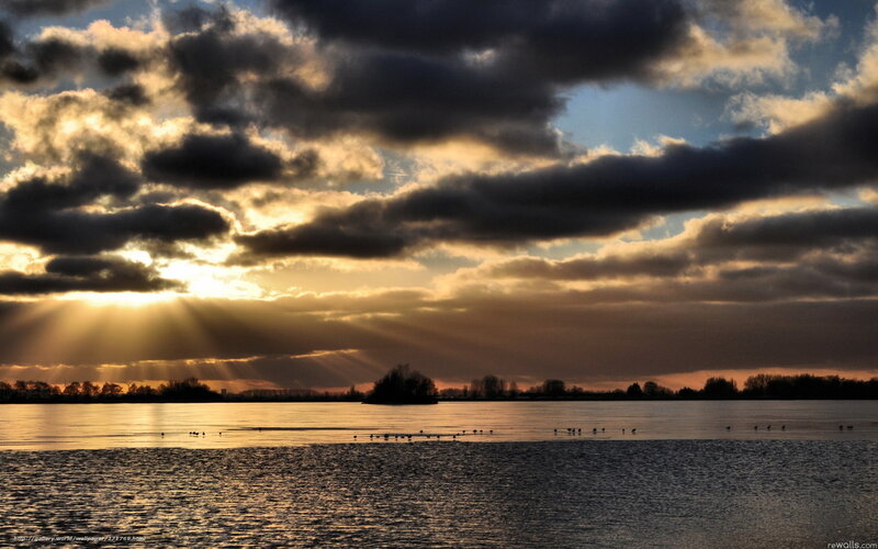 Sunlight Through Clouds over Water — Yellow, Dramatic