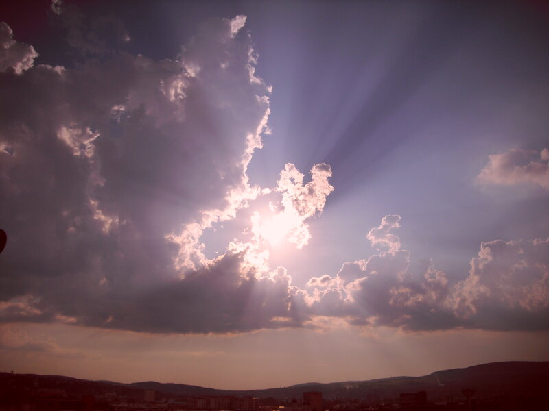 Sunlight Through Clouds — Purple, Dramatic, Sunset, Photograph, City
