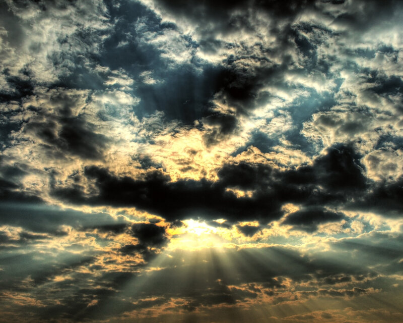 Sunlight Through Clouds — Sunset