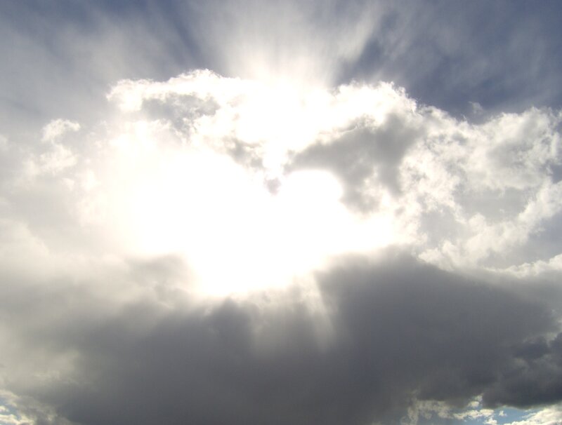 Sunlight Through Clouds — White, Dramatic, Photograph