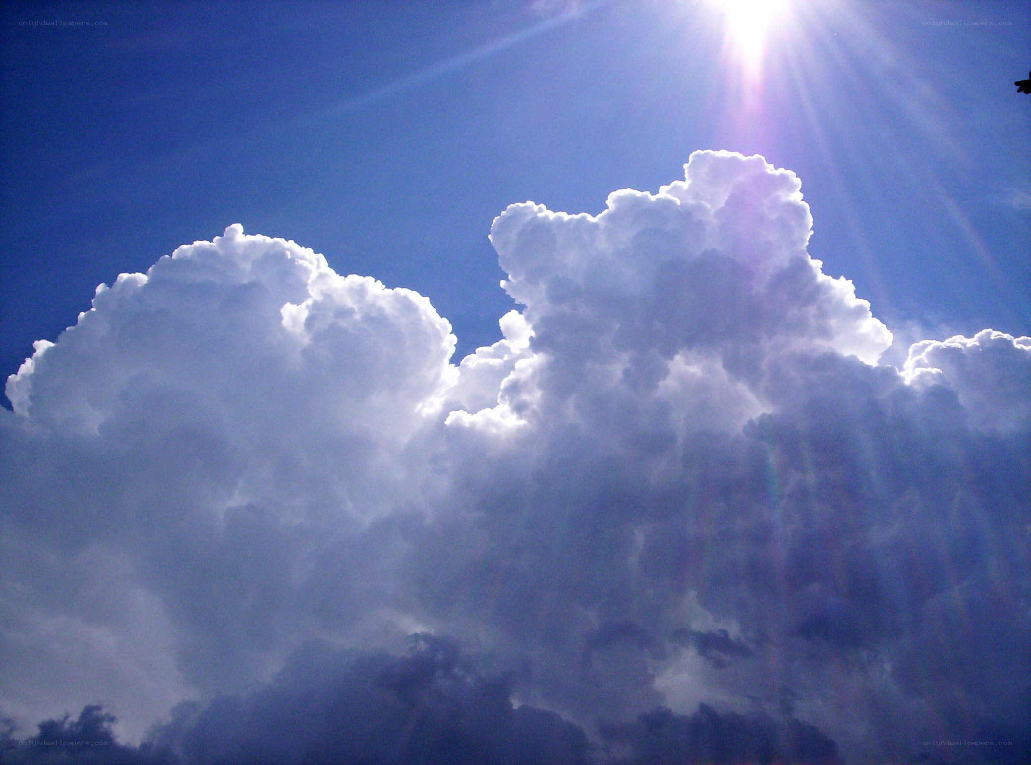 Sunlight through cumulus clouds
