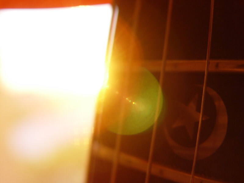 Sunlight through guitar strings
