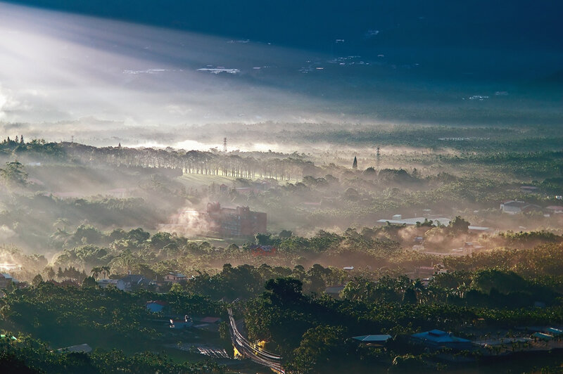 Sunlight through morning mist