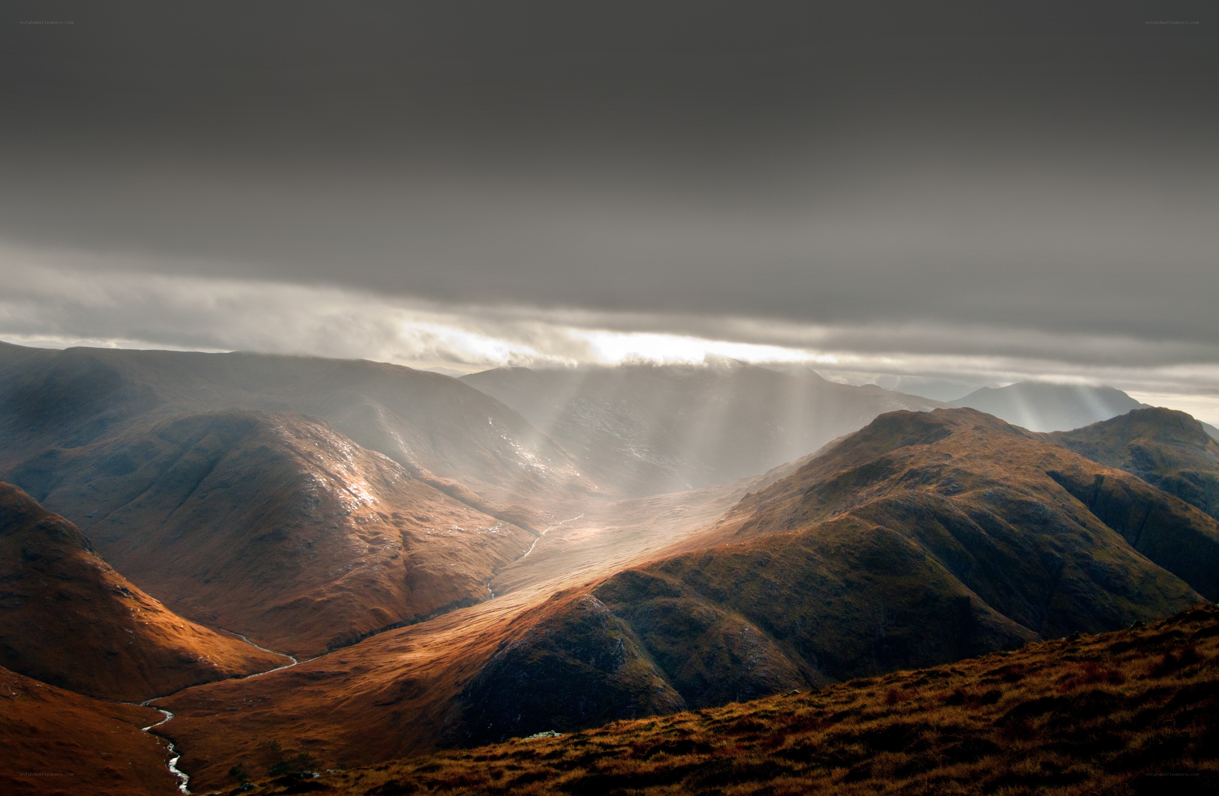 Sunlight through mountain clouds
