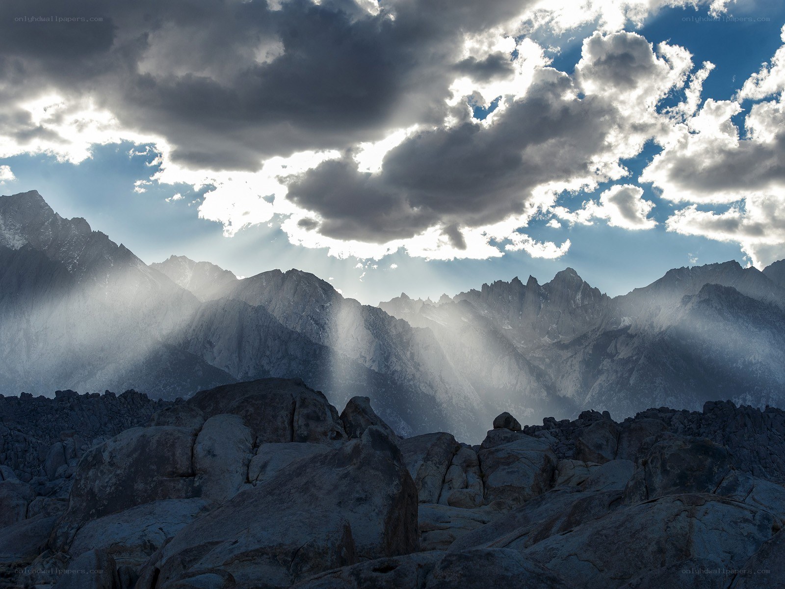 Sunlight through mountain clouds