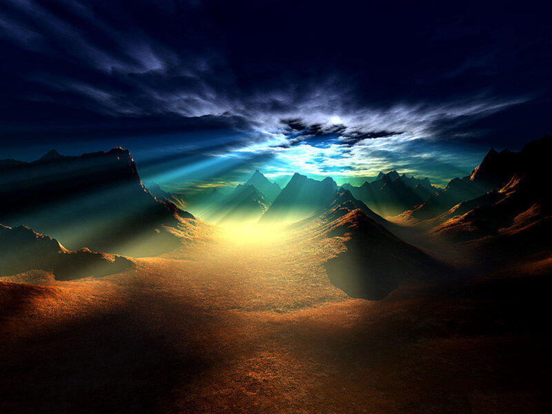 Sunlight through mountain peaks