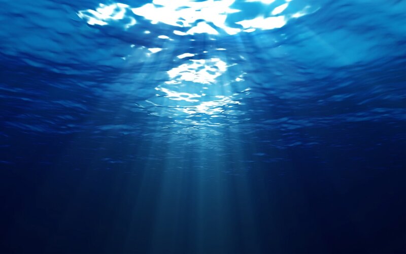 Sunlight Through Ocean Surface — Blue, Serene, Daytime