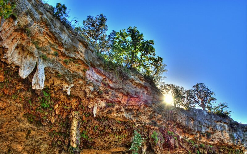 Sunlight Through Rock Cliff