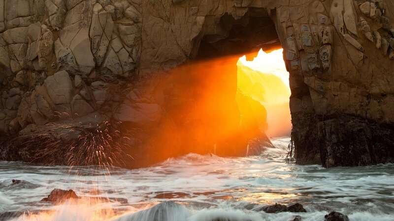 Sunlight Through Sea Cave — Orange, Dramatic, Sunset