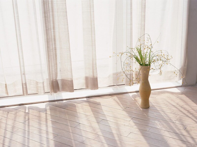Sunlight through sheer curtains