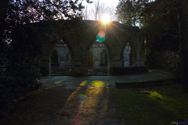 Sunlight through stone arches