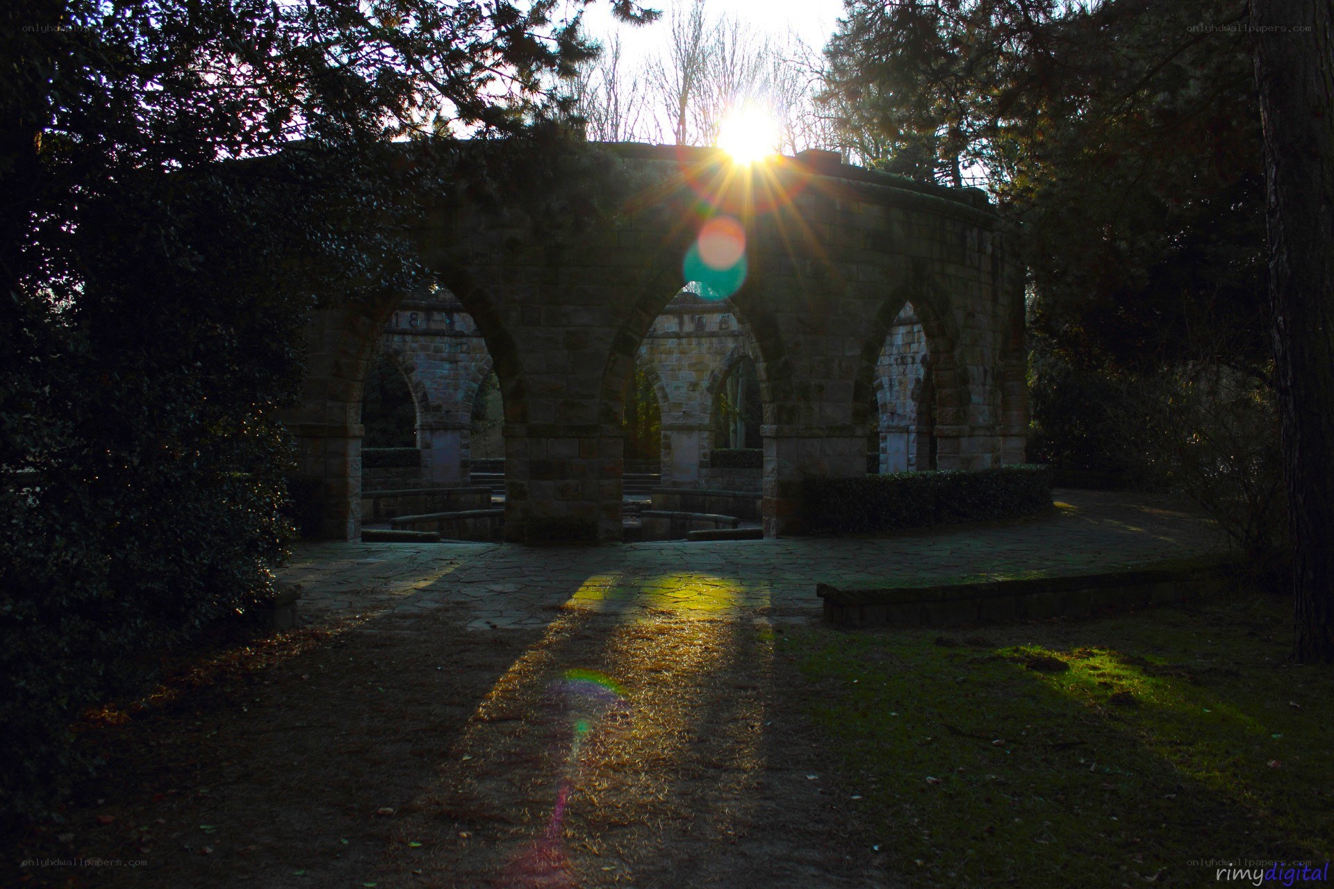 Sunlight through stone arches