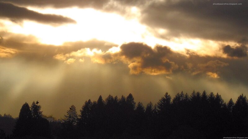 sunlight through storm clouds
