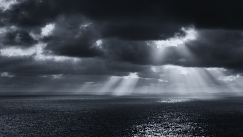 Sunlight Through Storm Clouds — Black, Dramatic, Photograph, Ocean