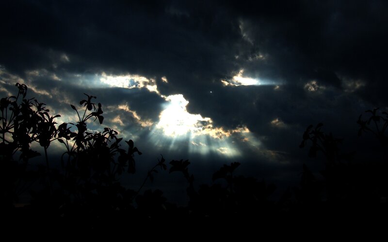Sunlight Through Storm Clouds — Black